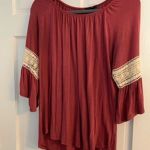 Bell sleeve rose colored top
